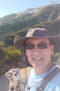 Java and Matt posing in front of the world famous Hollywood sign in Gr
